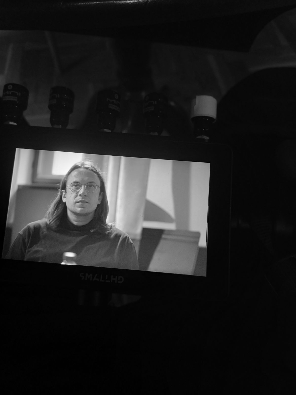 On set: the camera monitor and the sound gear beside it.